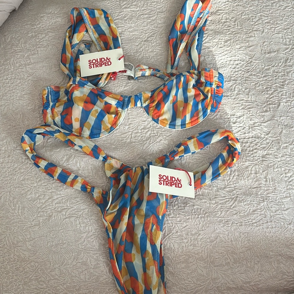 Brand new solid and stripped bathing suit